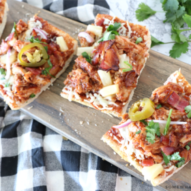 sliced french bread pizza on a cutting board