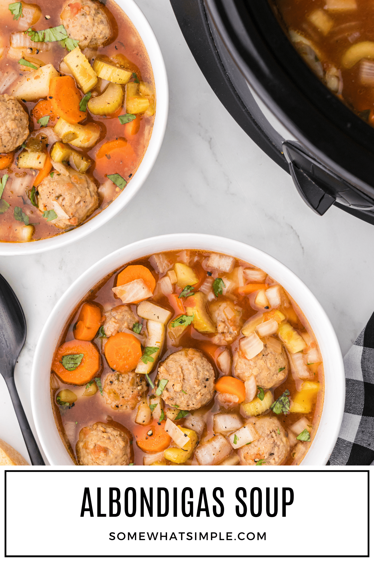 Albondigas soup is a popular Mexican recipe made with meatballs and fresh vegetables. This soup recipe is made in the crockpot, so it's easy, hearty, so delicious! via @somewhatsimple