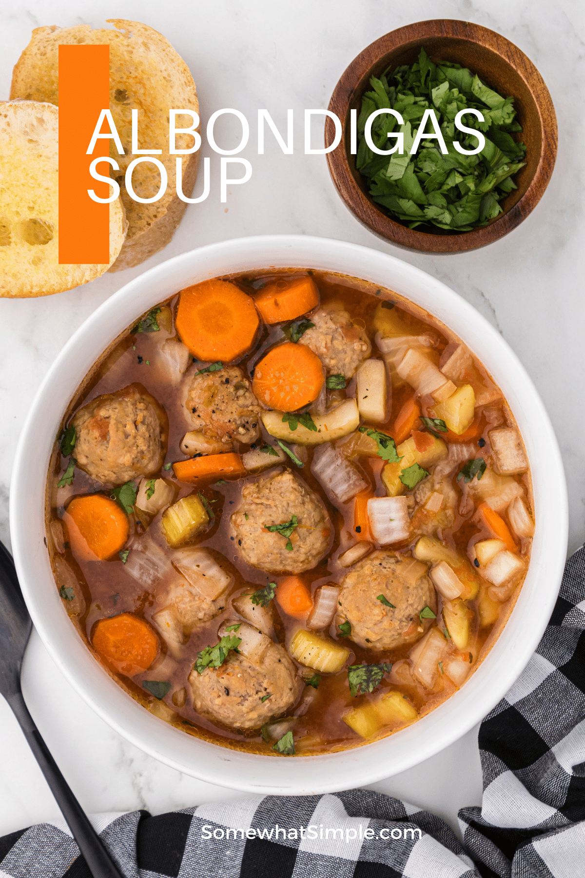 Albondigas soup is a popular Mexican recipe made with meatballs and fresh vegetables. This soup recipe is made in the crockpot, so it's easy, hearty, so delicious! via @somewhatsimple