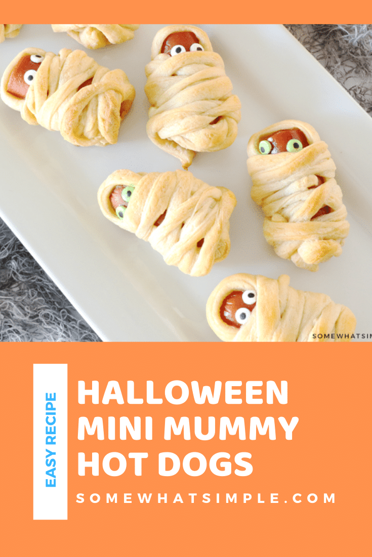 Mummy Hot Dogs are a hit with kids and Halloween party guests! They're a festive Halloween treat that's simple to make and delicious too! They're super easy to make by wrapping hot dogs in some crescent roll dough. They make the perfect Halloween snack or lunch recipe. via @somewhatsimple