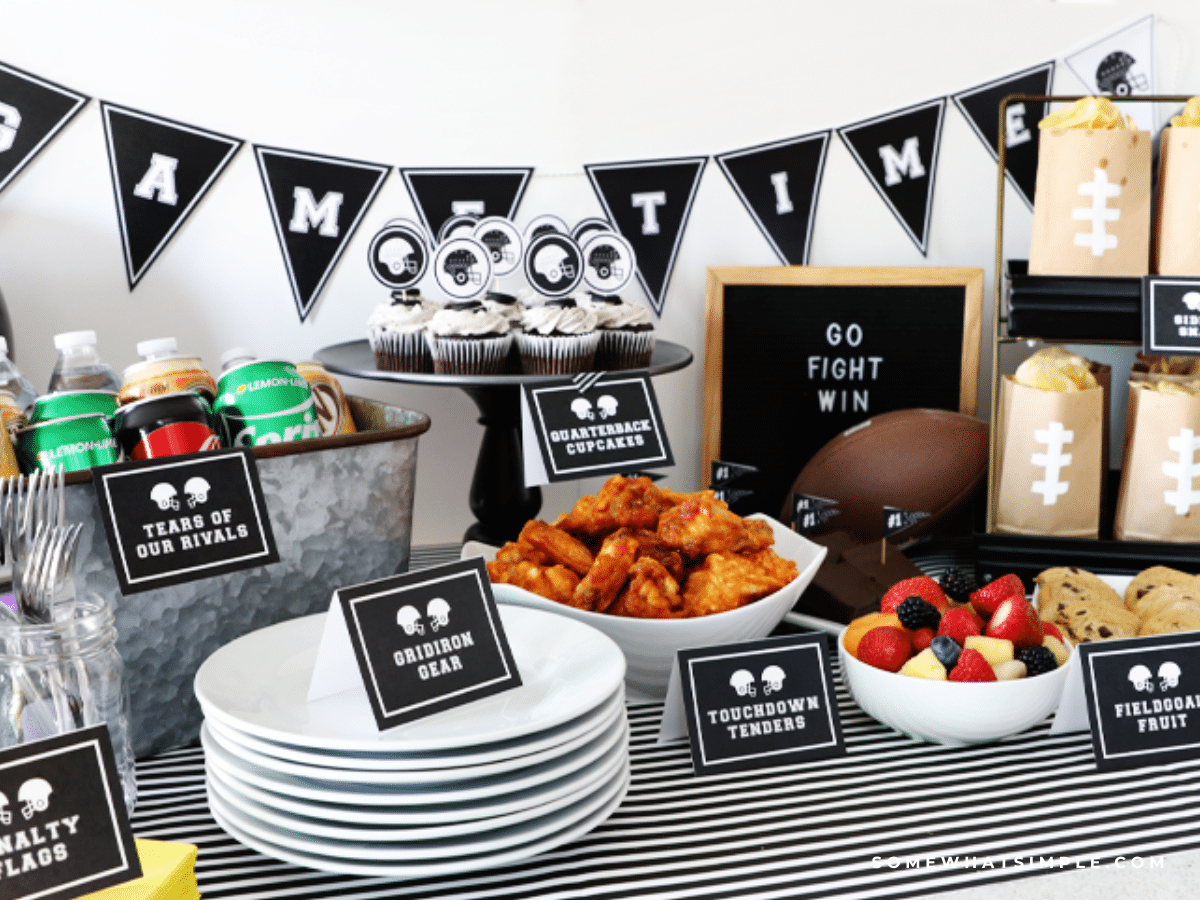 styled shot of a tailgate party spread with black and white printables
