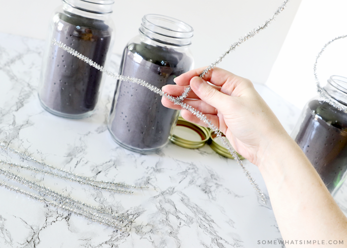 using pipe cleaner to make a lantern handle