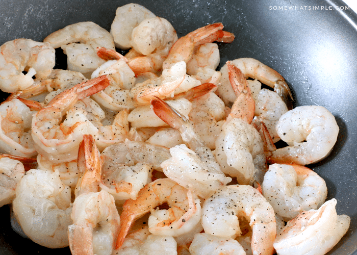 jumbo shrimp cooking in a pan