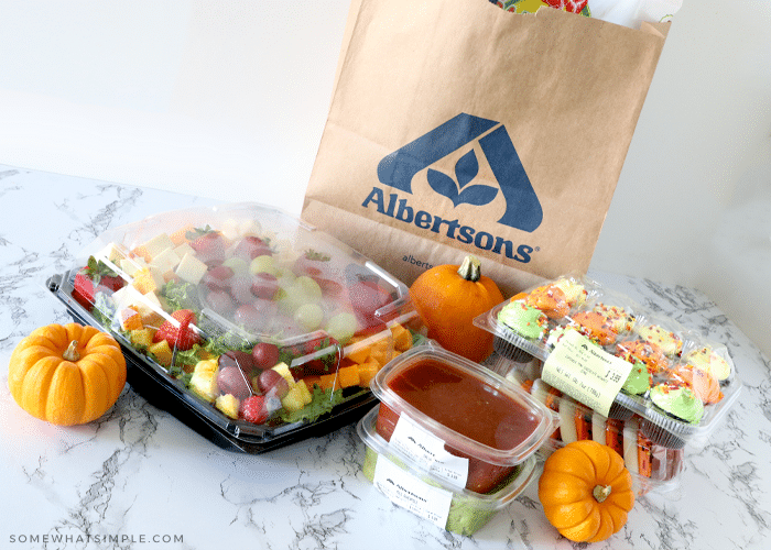 grocery bag on the counter full of food for a halloween lunch