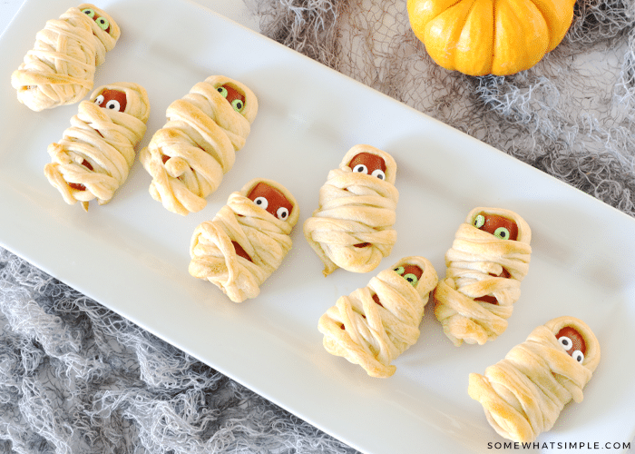 mini mummy hot dogs wrapped in strips of crescent roll dough