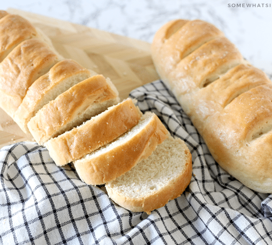 two loaves of french bread on a counter