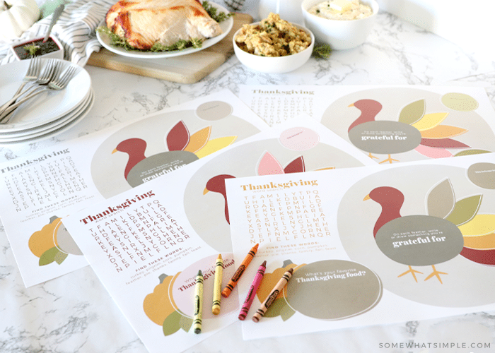 printable thanksgiving placemats in front of thanksgiving food