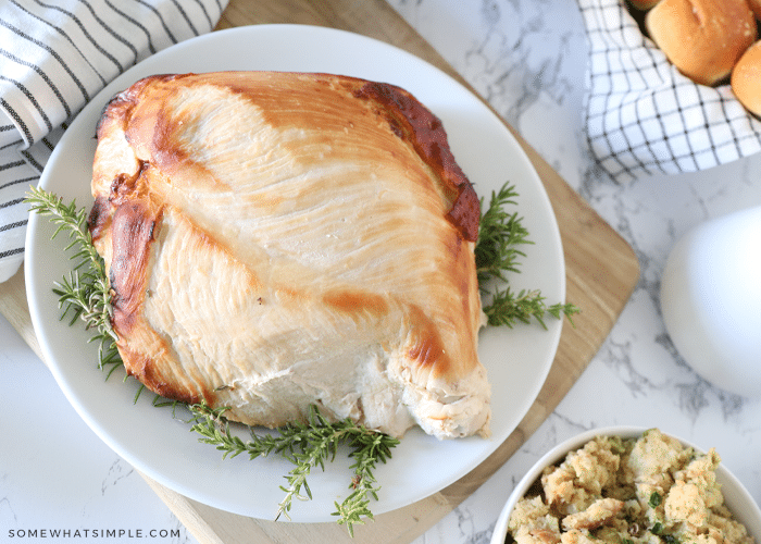 overhead shot of a turkey breast on a platter