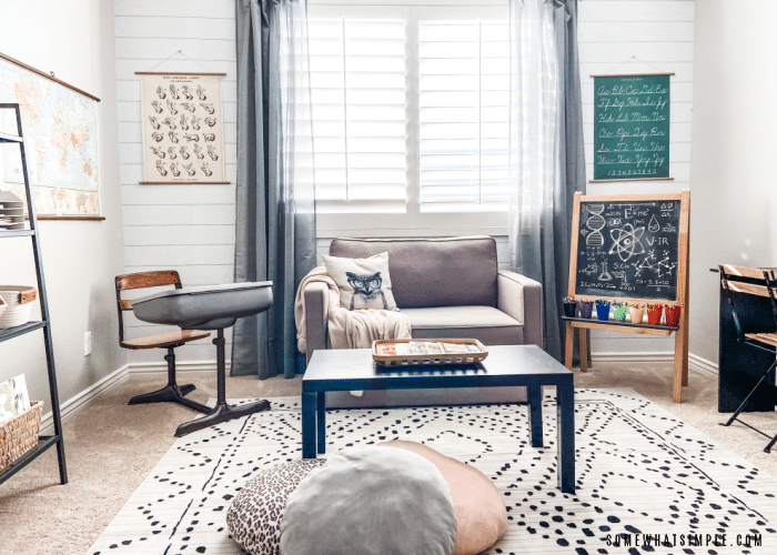 front view of a home classroom with a couch and a rug