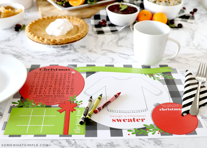 printable christmas placemats on the counter with food in the background