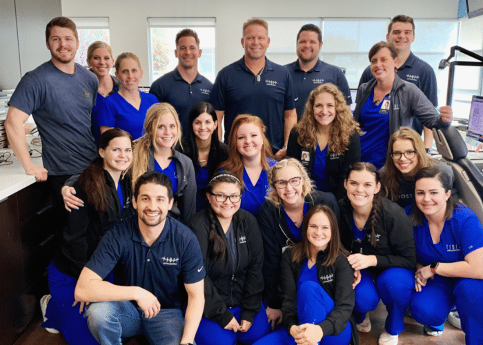 group shot of the frost orthodontics team