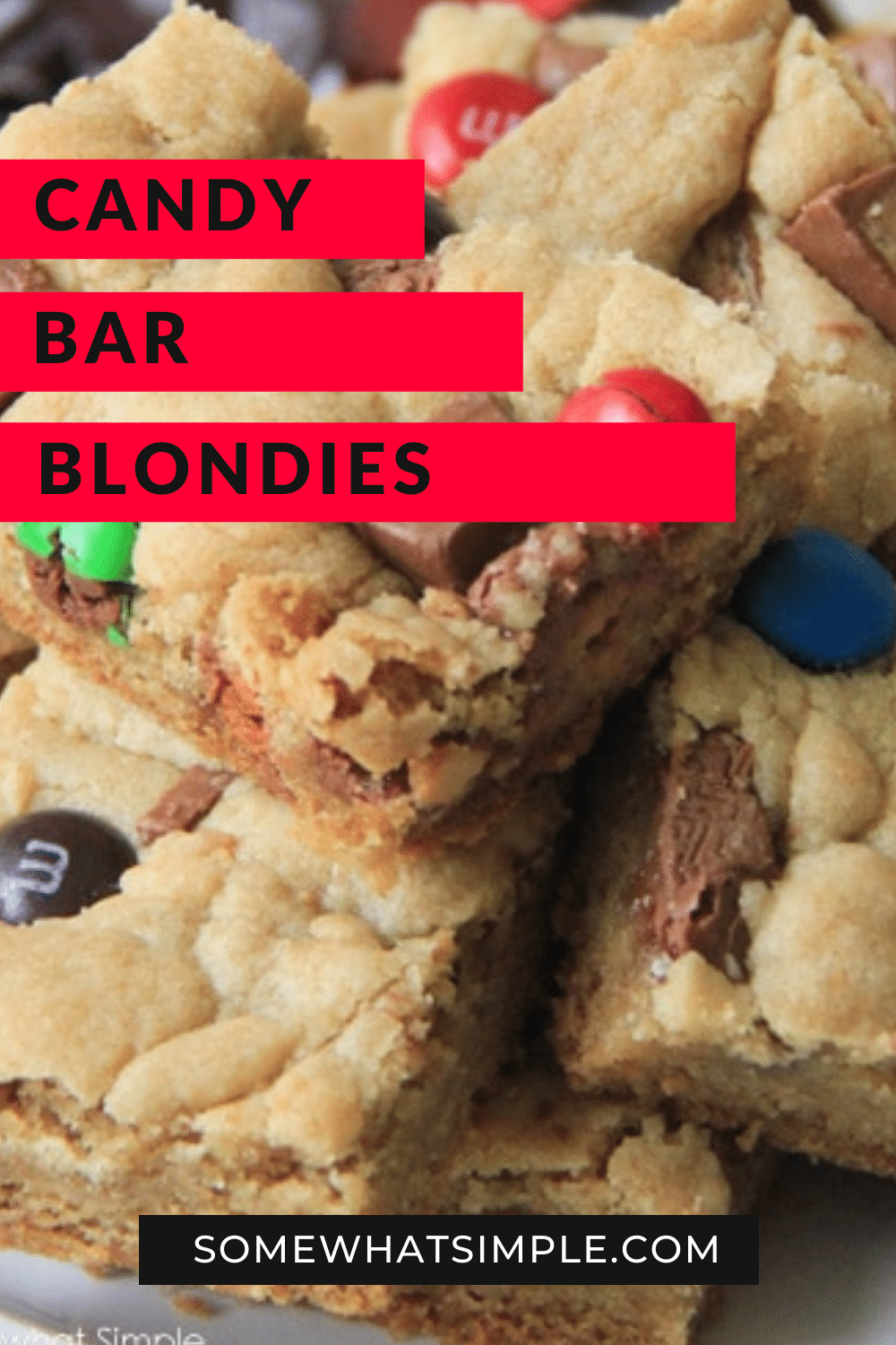 Candy Bar Blondies are a fun twist on a favorite dessert. The deliciously chewy brownie dough gets stuffed and topped with your favorite candies. It's a simple, sweet, and chocolatey treat! via @somewhatsimple