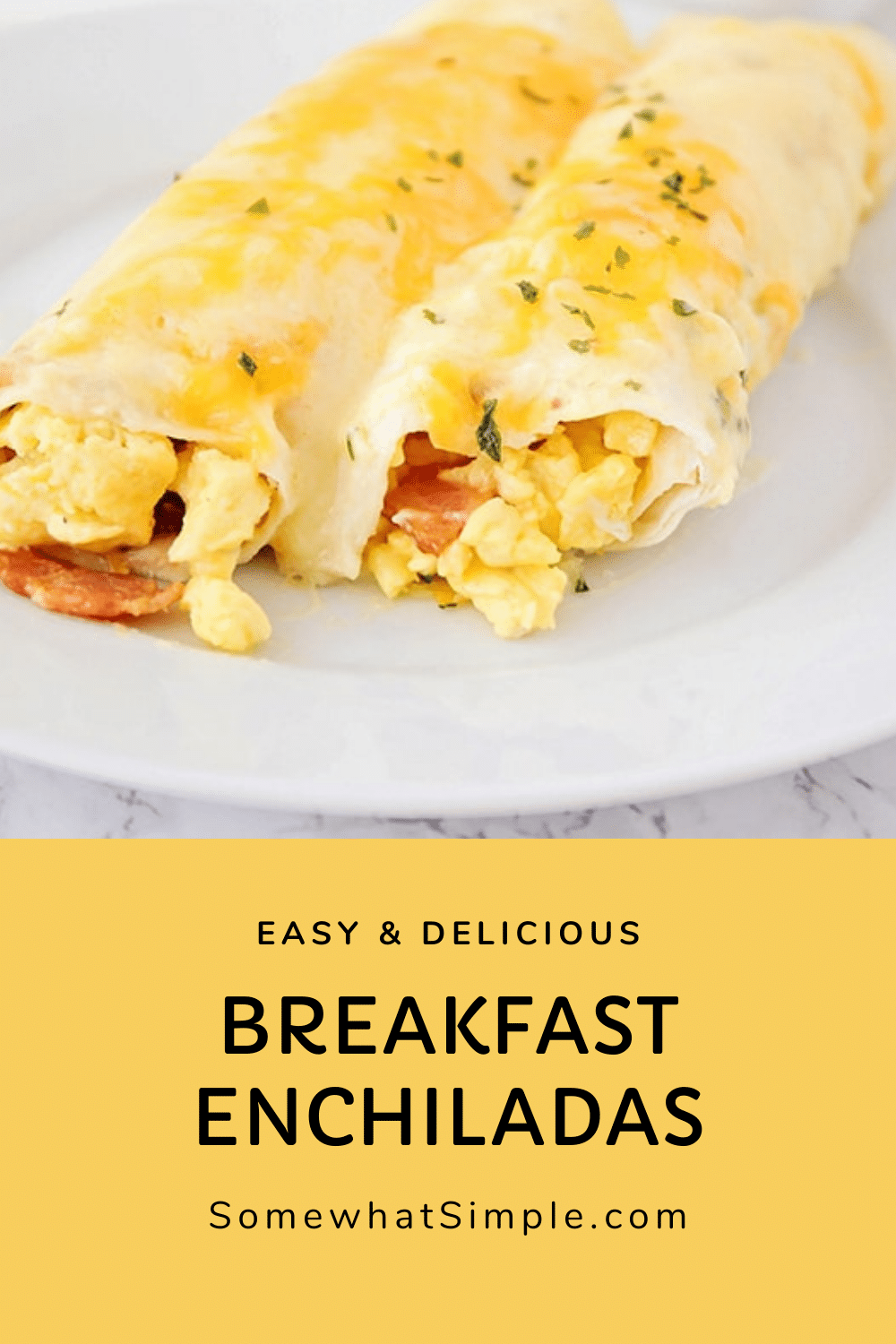 These amazing breakfast enchiladas are a fun twist on a traditional breakfast recipe! They're loaded with eggs, bacon, and cheese, and they are so delicious! The best part is that these breakfast enchiladas are that they can be frozen so you can make them ahead of time. via @somewhatsimple