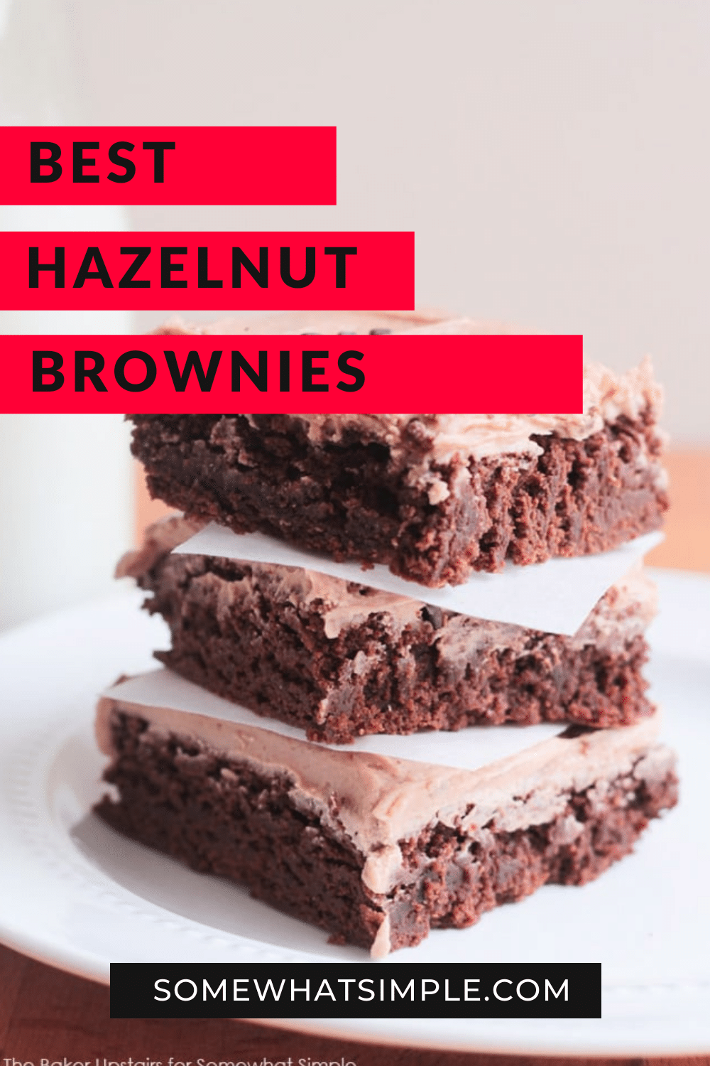 Chocolate hazelnut brownies, with an irresistible homemade frosting, are a delicious dessert that will satisfy any chocolate lover. The brownies are fudgy and delicious while the homemade hazelnut frosting is unlike anything you've ever tried. Go ahead and give these a shot and you can thank me later. via @somewhatsimple