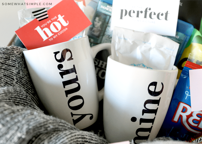 hot cocoa mugs that say "yours" and "mine" on them