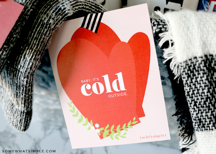 baby its cold outside gift tag on a date night basket