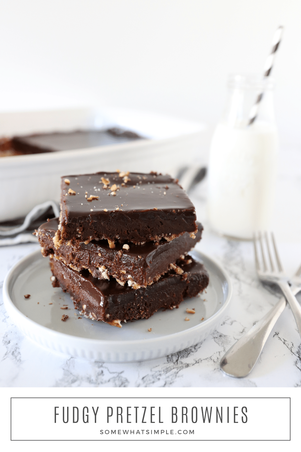 A crunchy pretzel crust under a fudgy banana brownie topped with the most heavenly hazelnut chocolate ganache ever created. These Pretzel Crusted Brownies are absolute heaven in a pan! There's nothing like have a sweet fudge brownie with the salty flavor of a pretzel crust! via @somewhatsimple