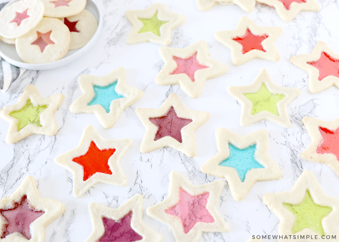 star stained glass cookies on a white counter