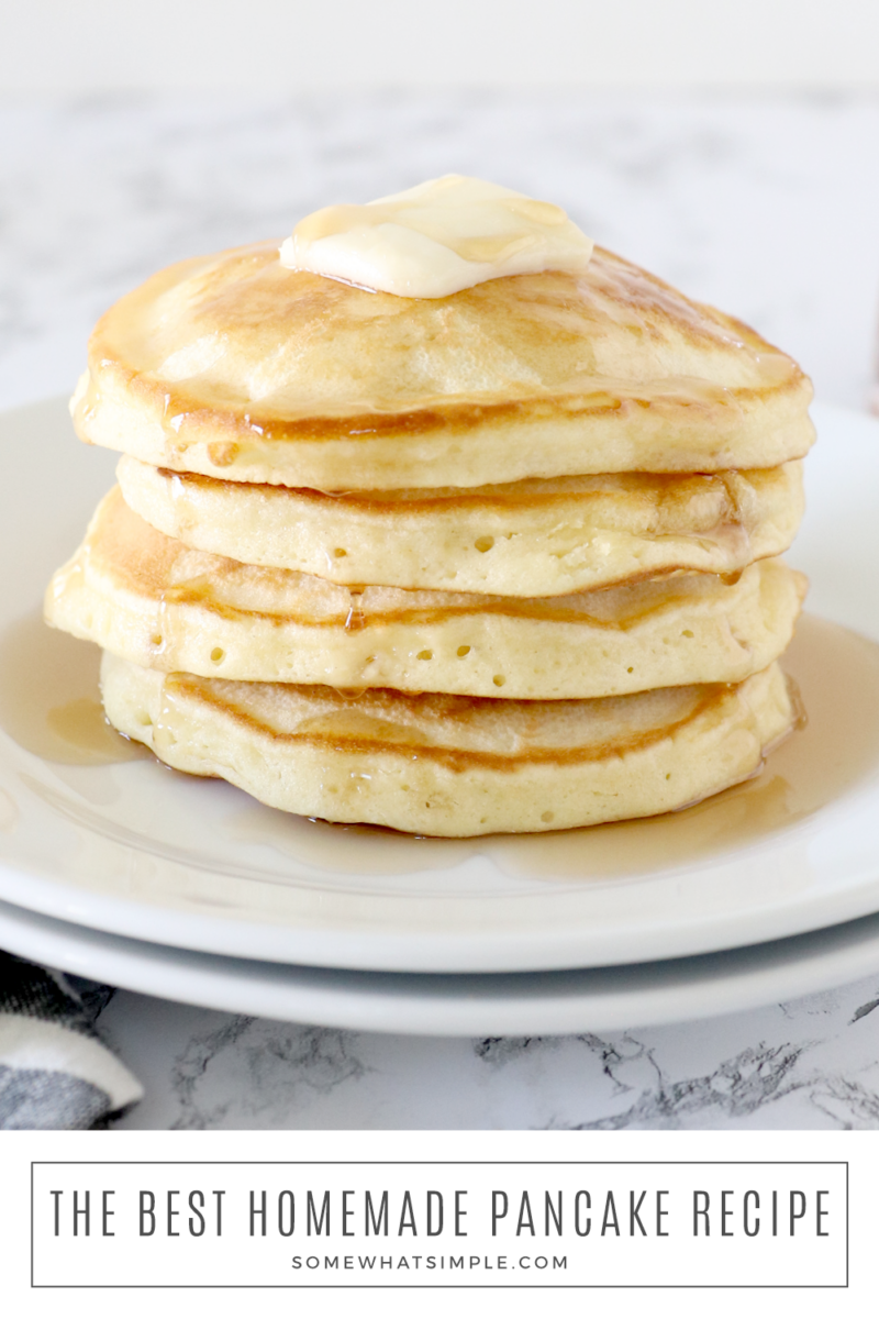 a stack of 4 homemade pancakes with a pat of butter and syrup