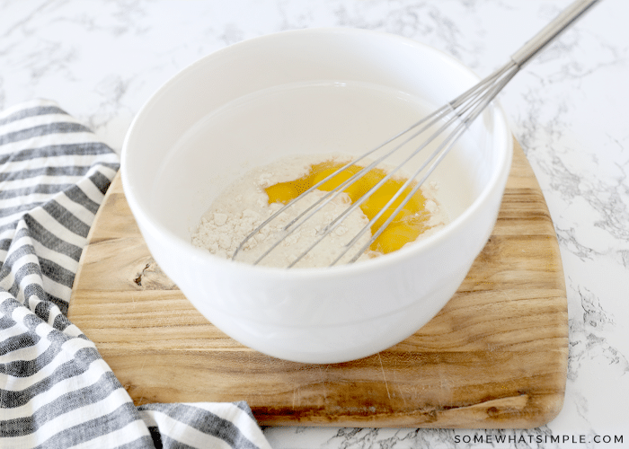 bisquick in a bowl with eggs