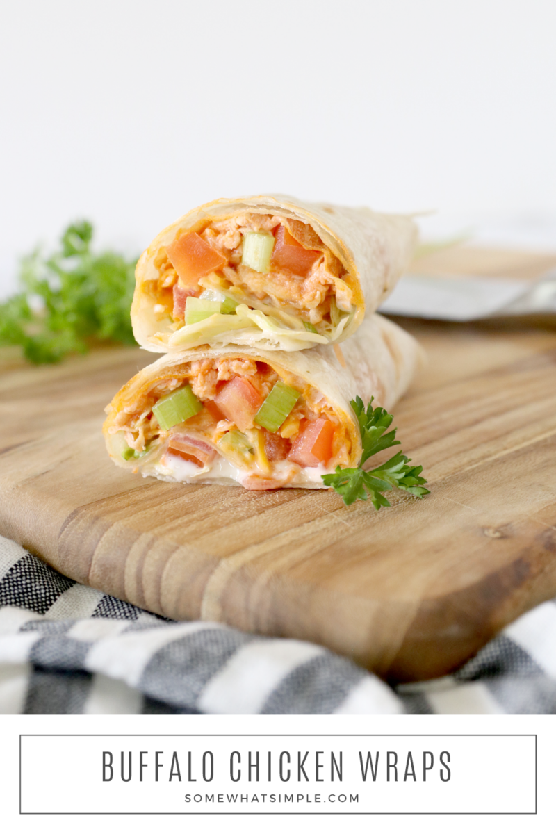 stacked buffalo chicken wraps on a cutting board