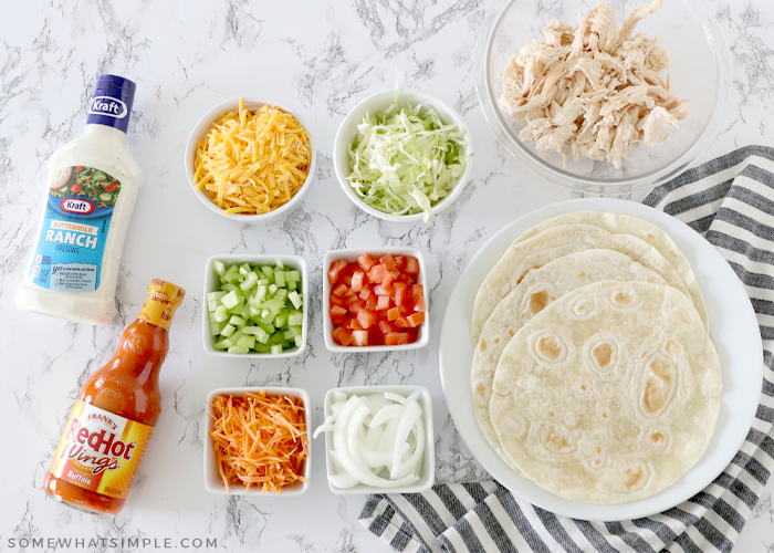 ingredients for chicken wraps on the counter