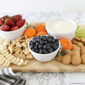 marshmallow cream dip on a charcuterie board