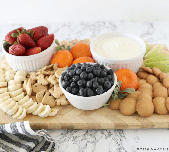 marshmallow cream dip on a charcuterie board