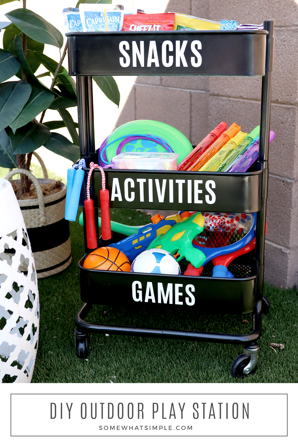 This simple and fun outdoor play station has everything you need to keep the kids entertained and hydrated all summer long! via @somewhatsimple