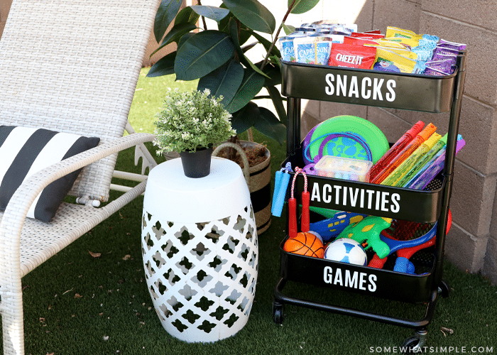 outdoor play station filled with toys and snacks