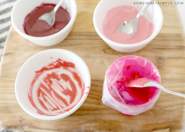 adding frosting to a piping bag