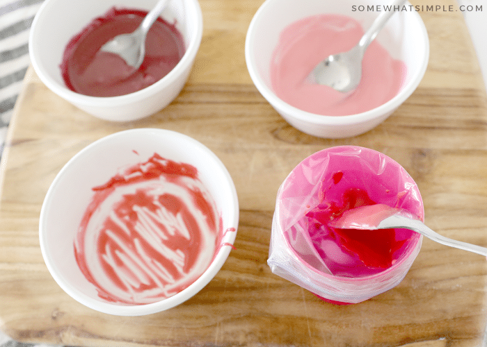 adding frosting to a piping bag