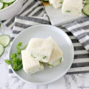 cucumber sandwiches on a striped napkin