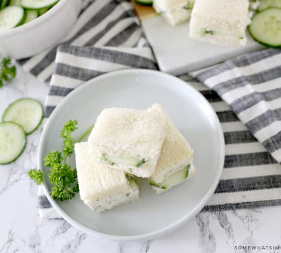 cucumber sandwiches on a striped napkin