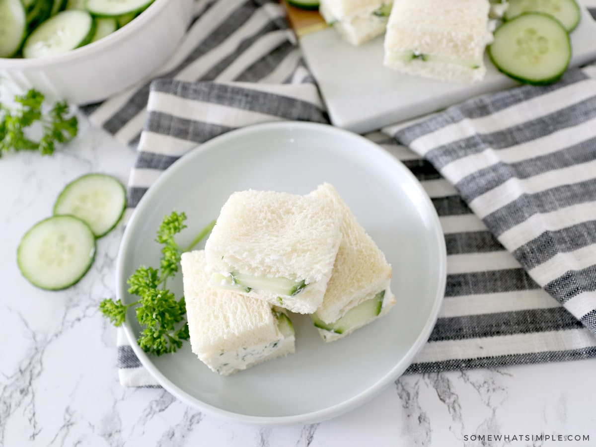 cucumber sandwiches on a striped napkin