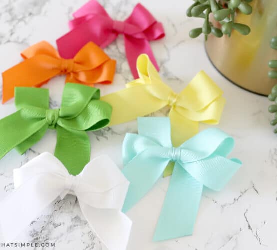 6 colors of hair bows laying on the counter