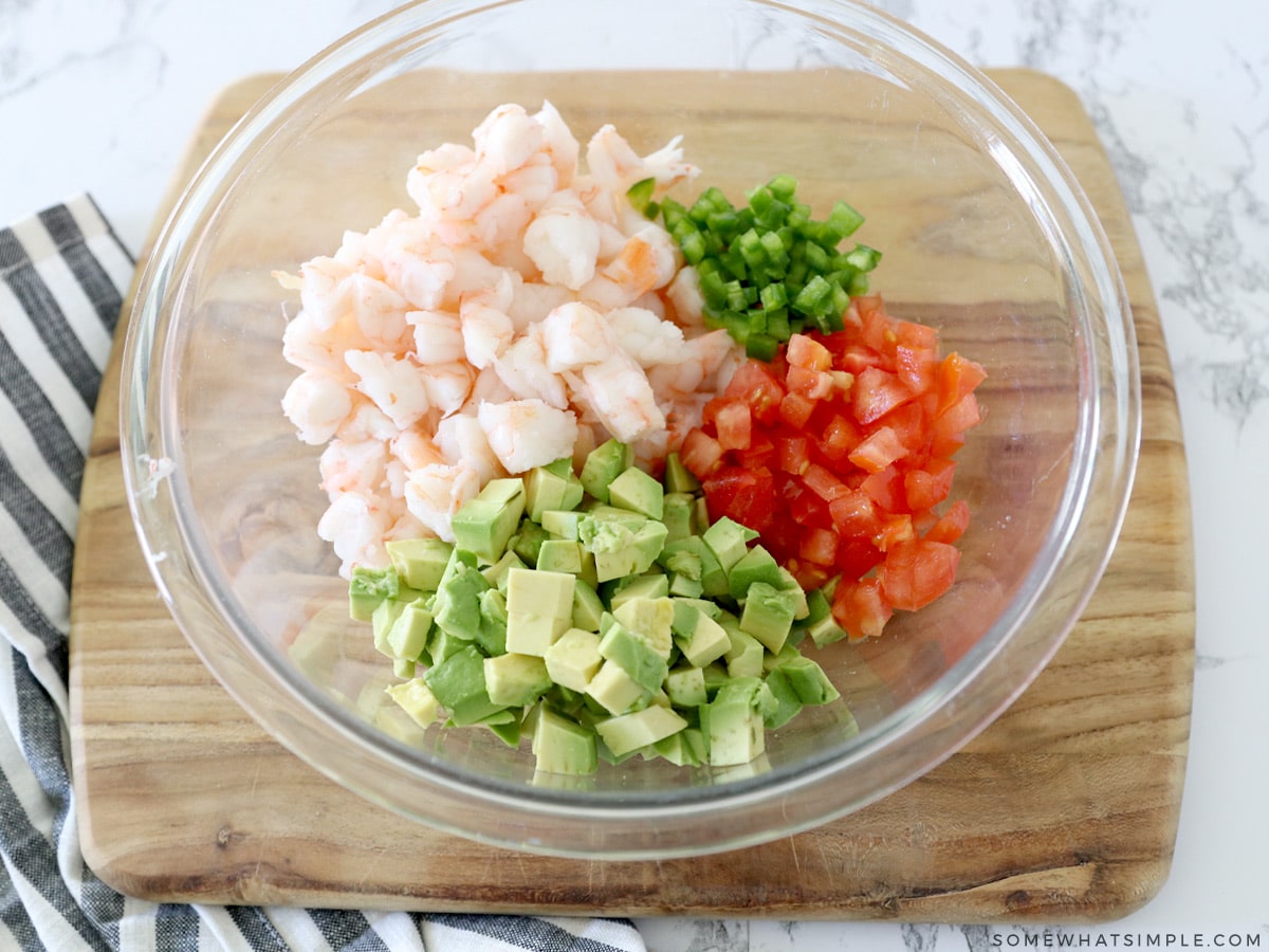 large bowl with shrimp, tomato, avocado and jalapeno