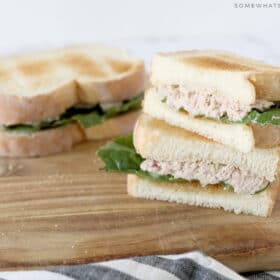 tuna salad sandwich cut in half and stacked on top of each other