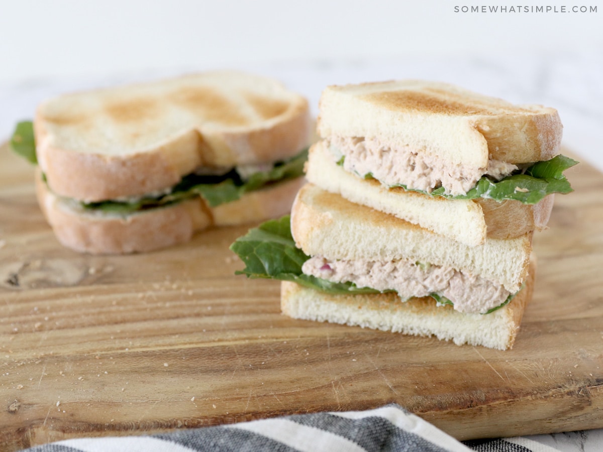 tuna salad sandwich cut in half and stacked on top of each other