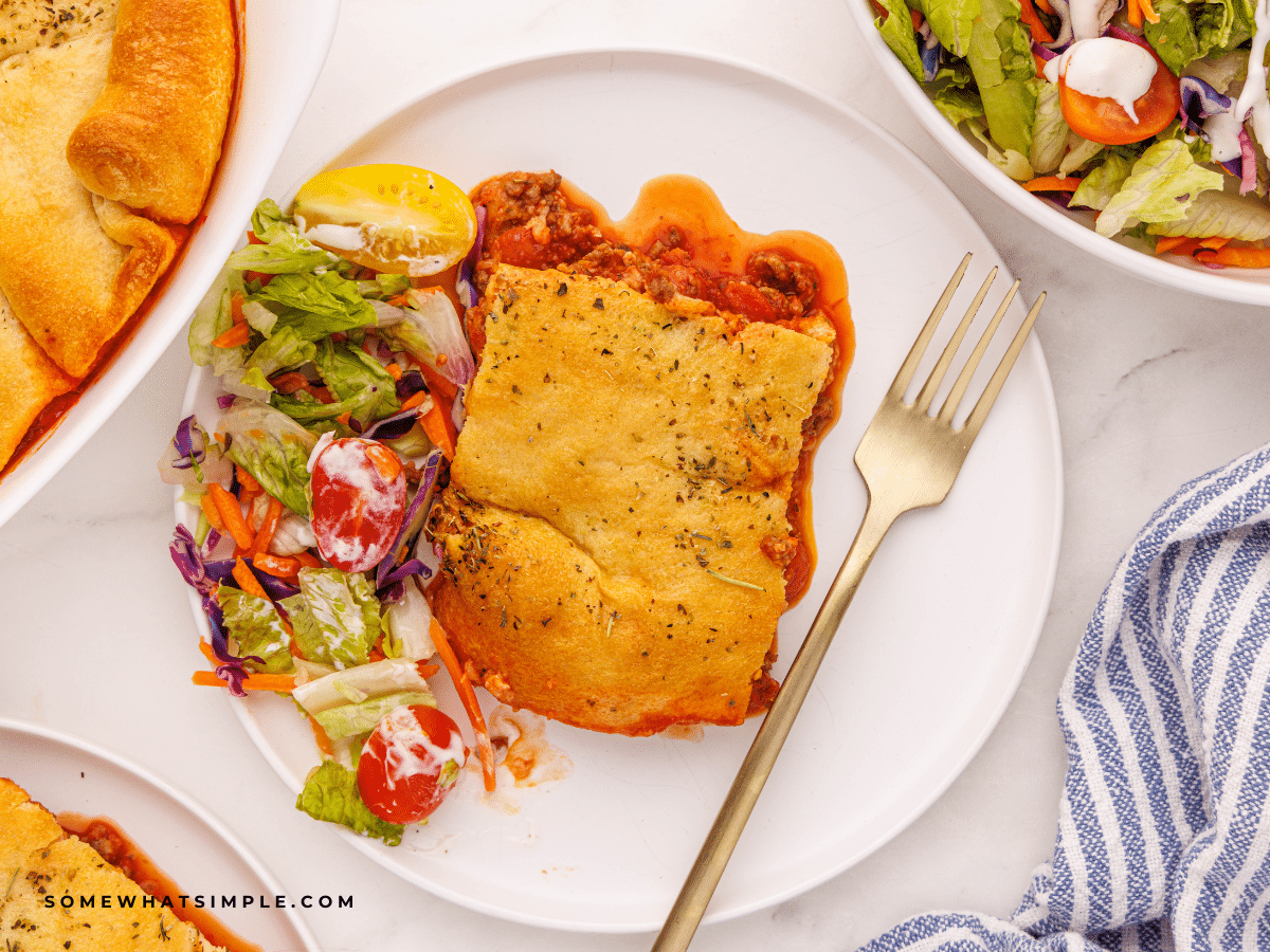 Upside Down Deep Dish Pizza plated with a garden salad