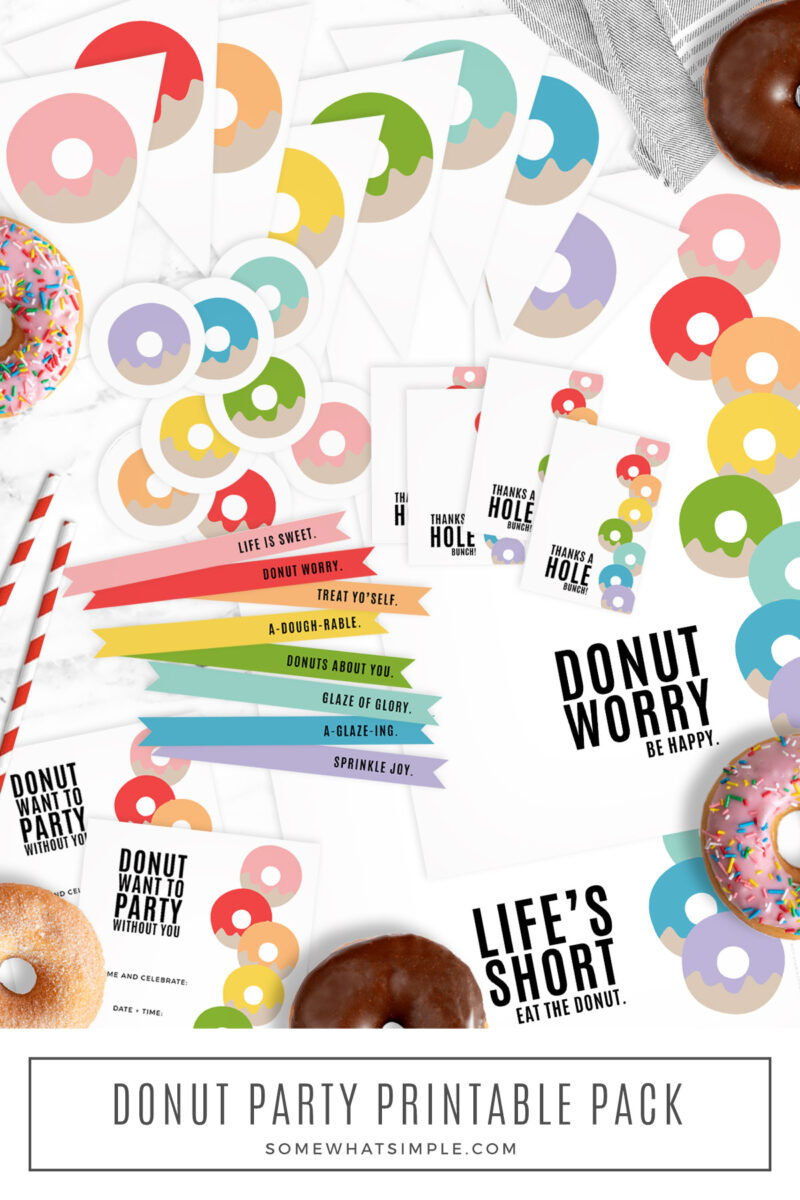 huge pack of donut party printables on a white counter top