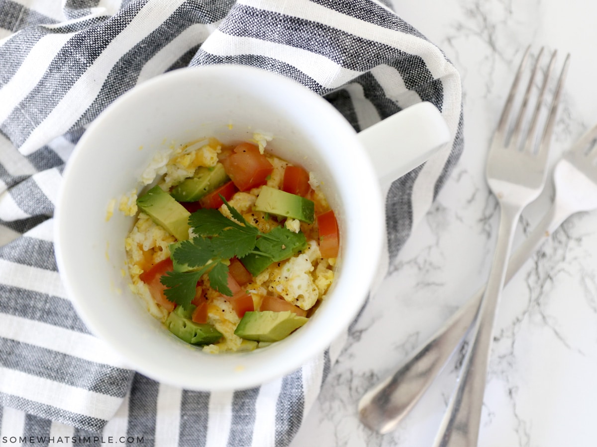 ingredients of an omelet in a mug