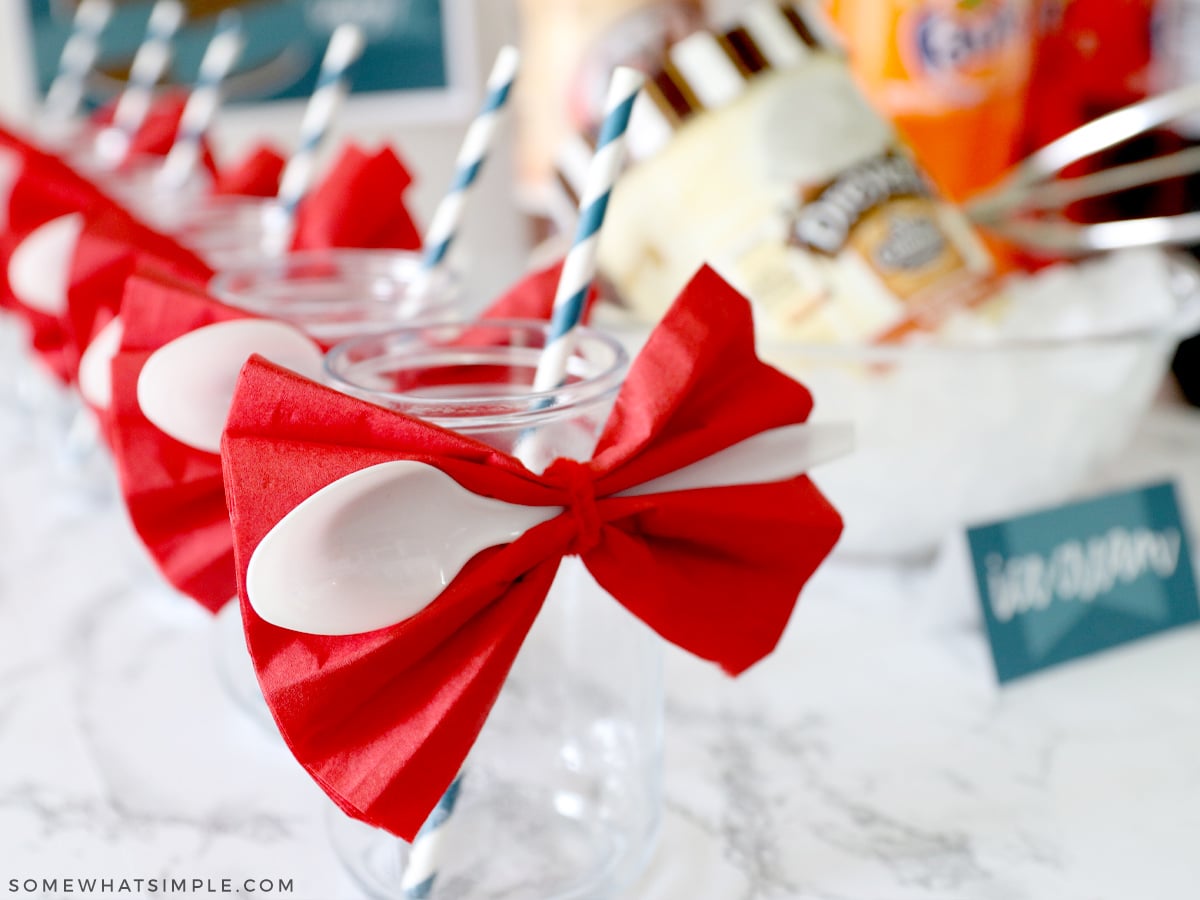 ice cream float cups with napkins and spoons