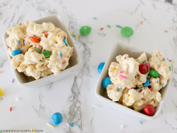 finished marshmallow popcorn in small white bowls