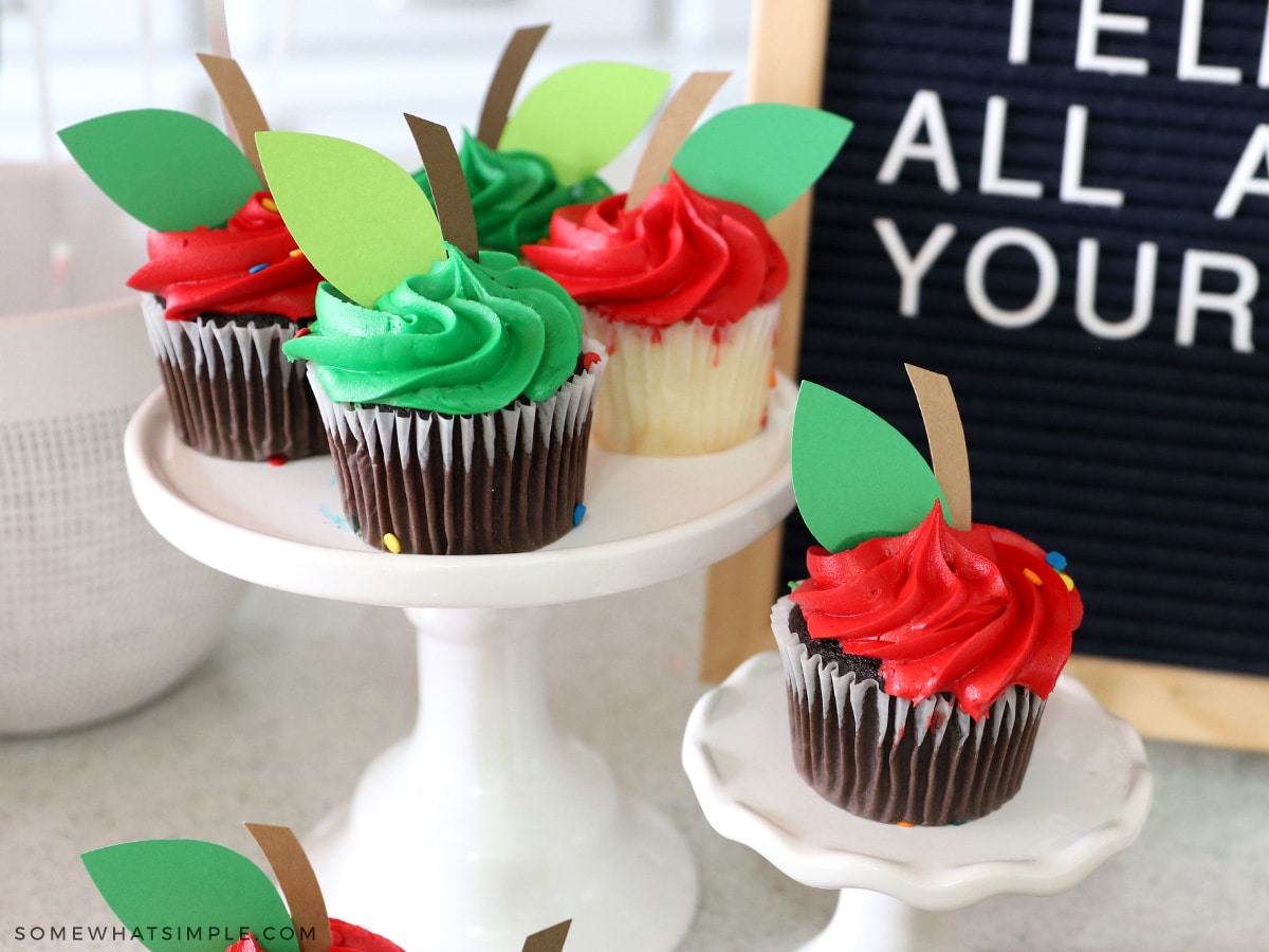 adding leaves to cupcakes