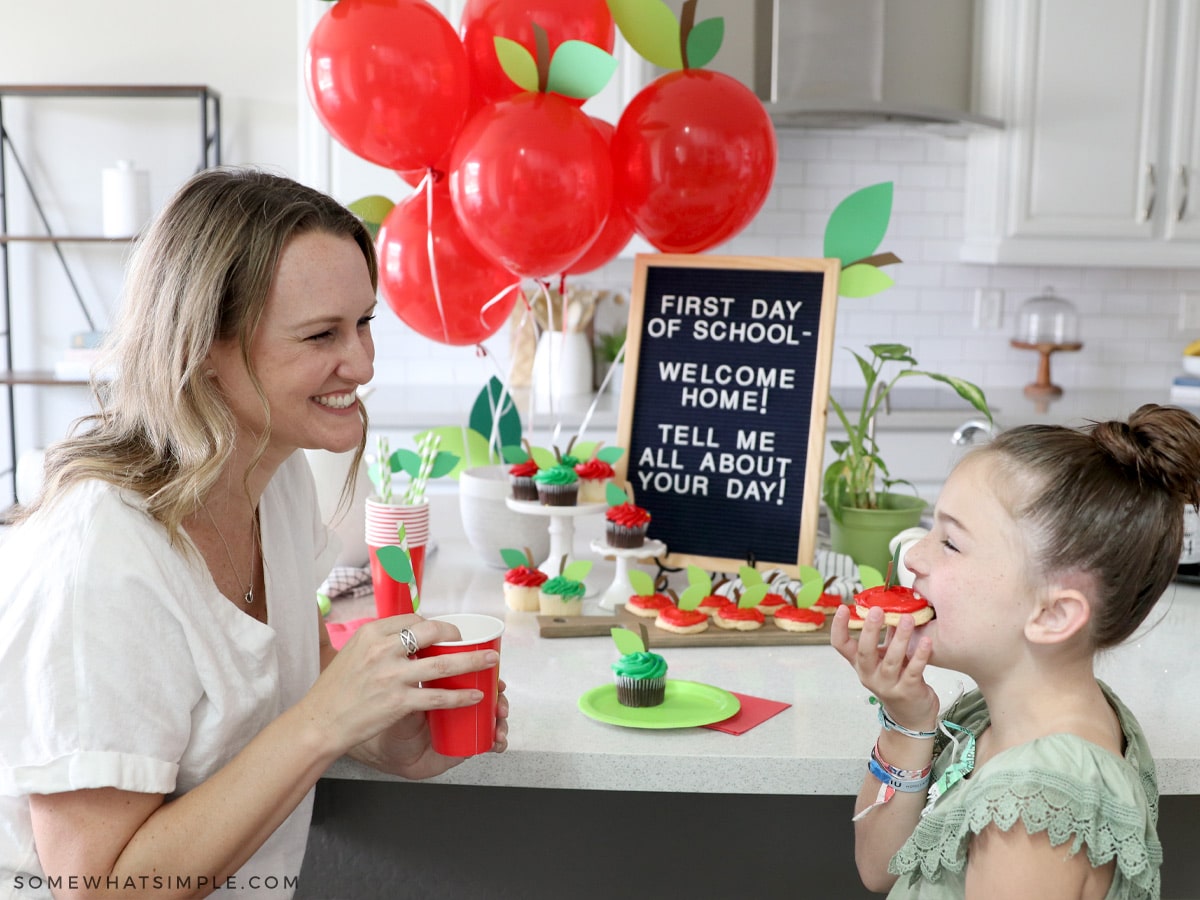 mom and daughter enjoying treats at the counter