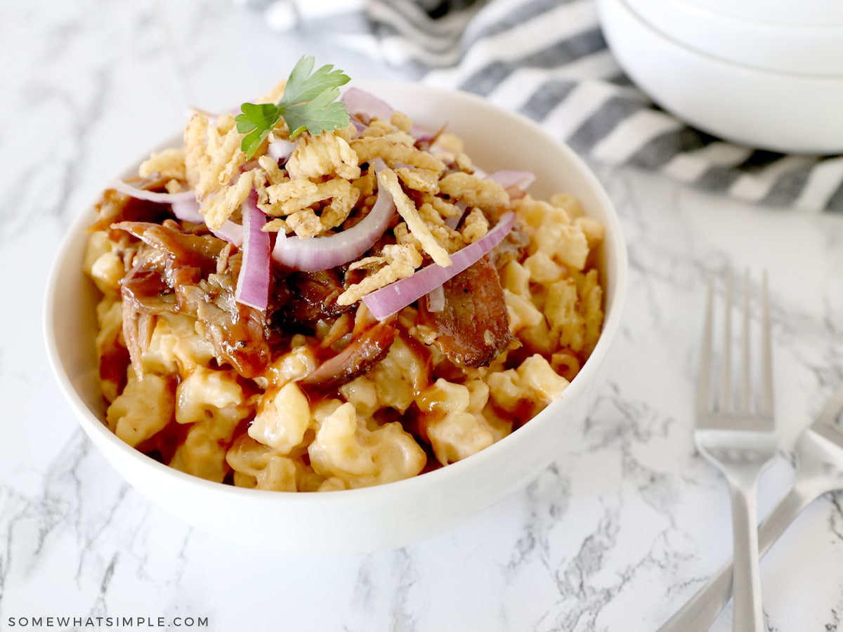 brisket mac and cheese in a white bowl