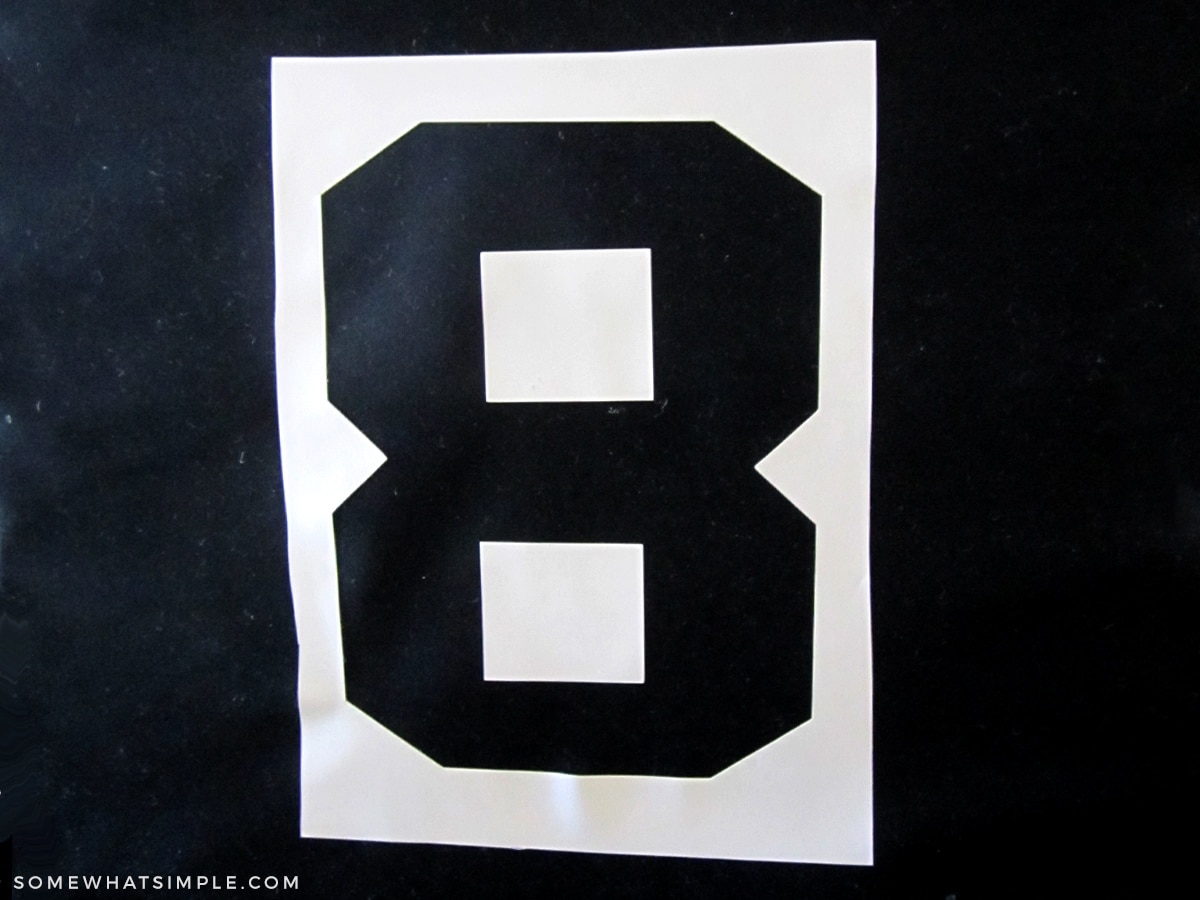 number 8 on a black fabric bin