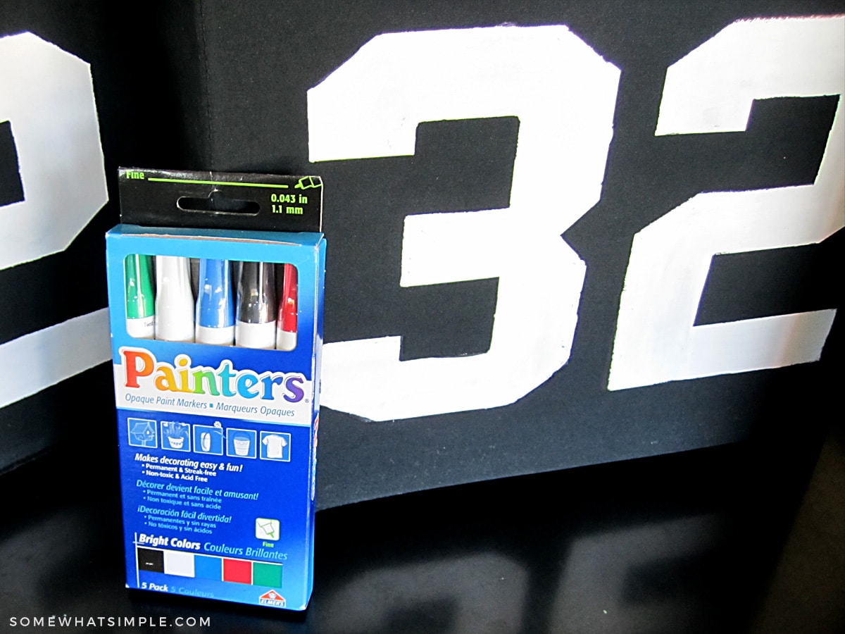 painters pens next to a black bin