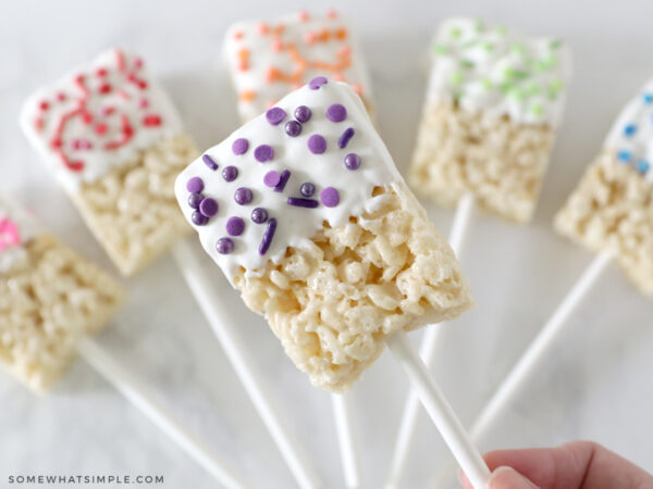 chocolate covered rice krispie treats on a stick